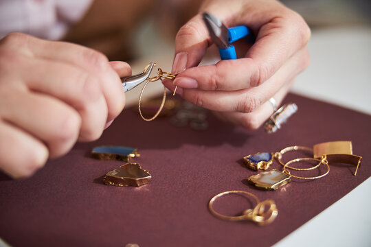 Craftsperson working on jewelry